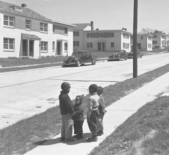 Picture of Black children playing outside Washington, D.C.'s Barry Farms Housing Development in 1944.